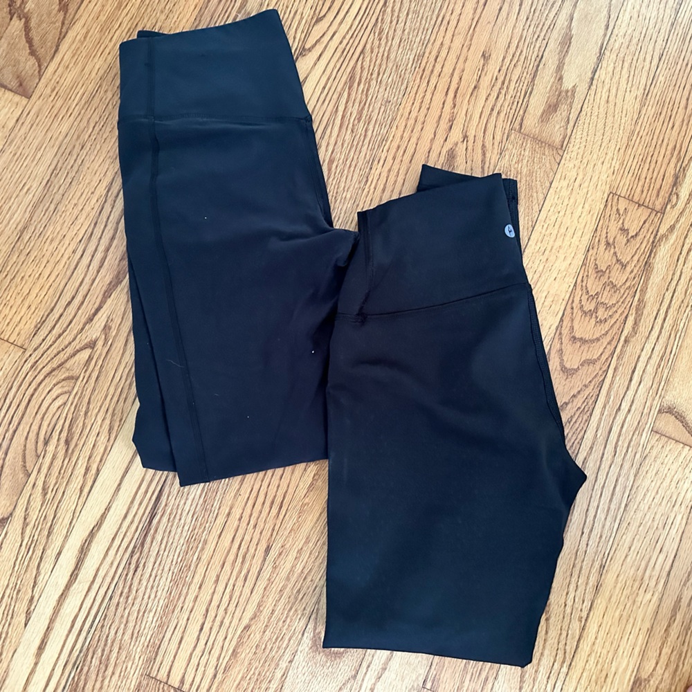 Two pairs of tight fitting black leggings, bought from TJ Maxx